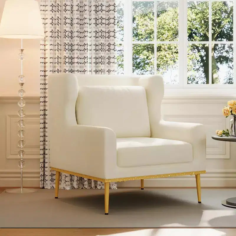 Fauteuil moderne en velours avec oreiller, silhouette incurvée, cadre en fer, assise en mousse haute densité, capacité de 150 kg